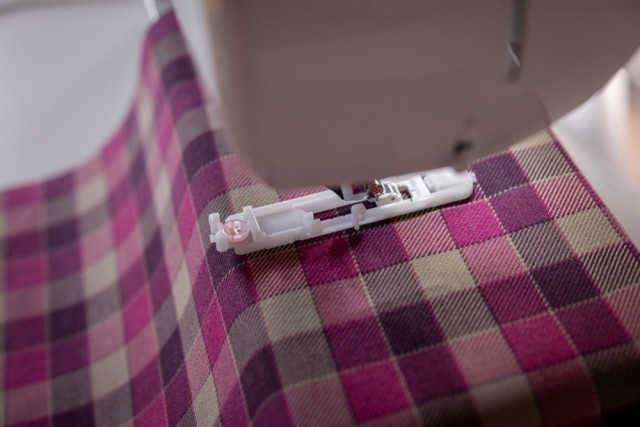 Sy vakre knapphull uansett stoff.